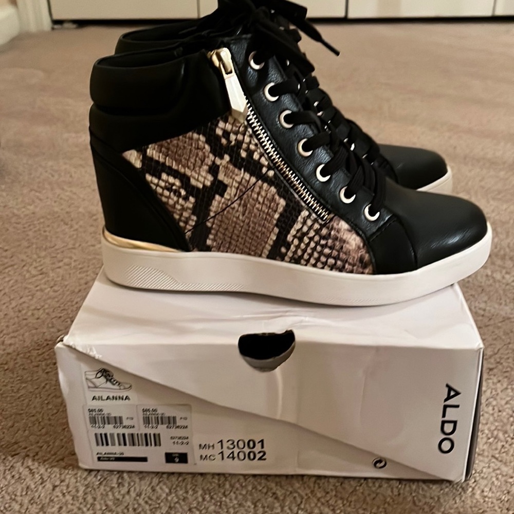 Aldo Ailanna size 9 high top sneakers.